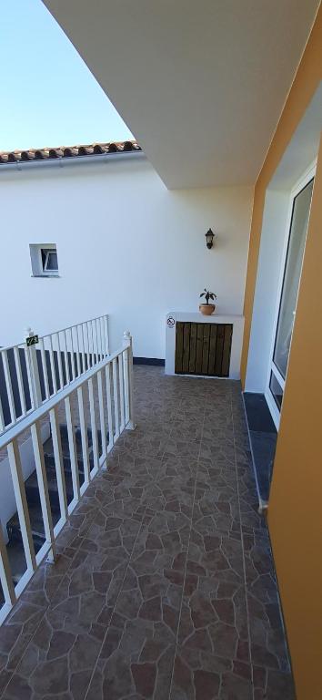 Balkón nebo terasa v ubytování Casinha do Chorão