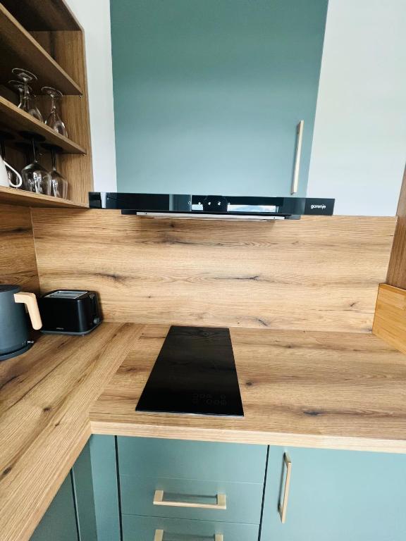 Kuchyň nebo kuchyňský kout v ubytování Sofia Apartment & Zimmer Nähe Redbull Ring