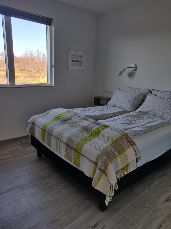 Postel nebo postele na pokoji v ubytování Mývatn apartments