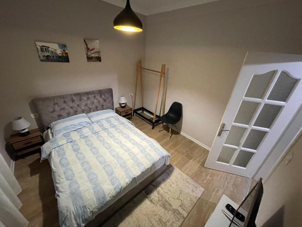 Postel nebo postele na pokoji v ubytování Elite Apartments Korçë