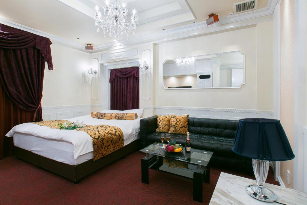 Postel nebo postele na pokoji v ubytování Hotel ELEMENT -エレメント-