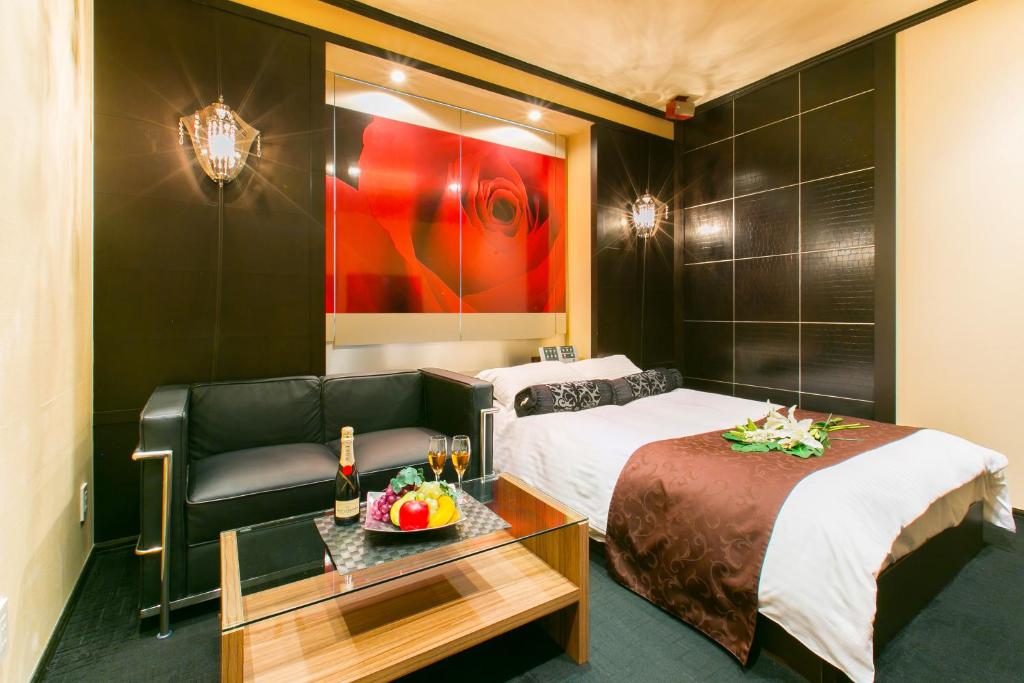 Postel nebo postele na pokoji v ubytování Hotel ELEMENT -エレメント-