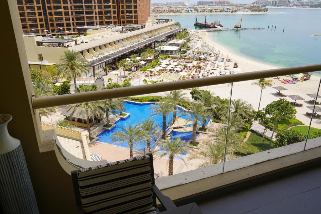 a view of the beach from a hotel room at Royal Club By RVHR, Palm Jumeirah in Dubai