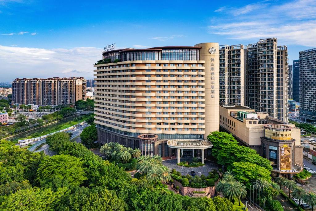 an aerial view of a building in a city at Pullman Foshan Shunde in Shunde