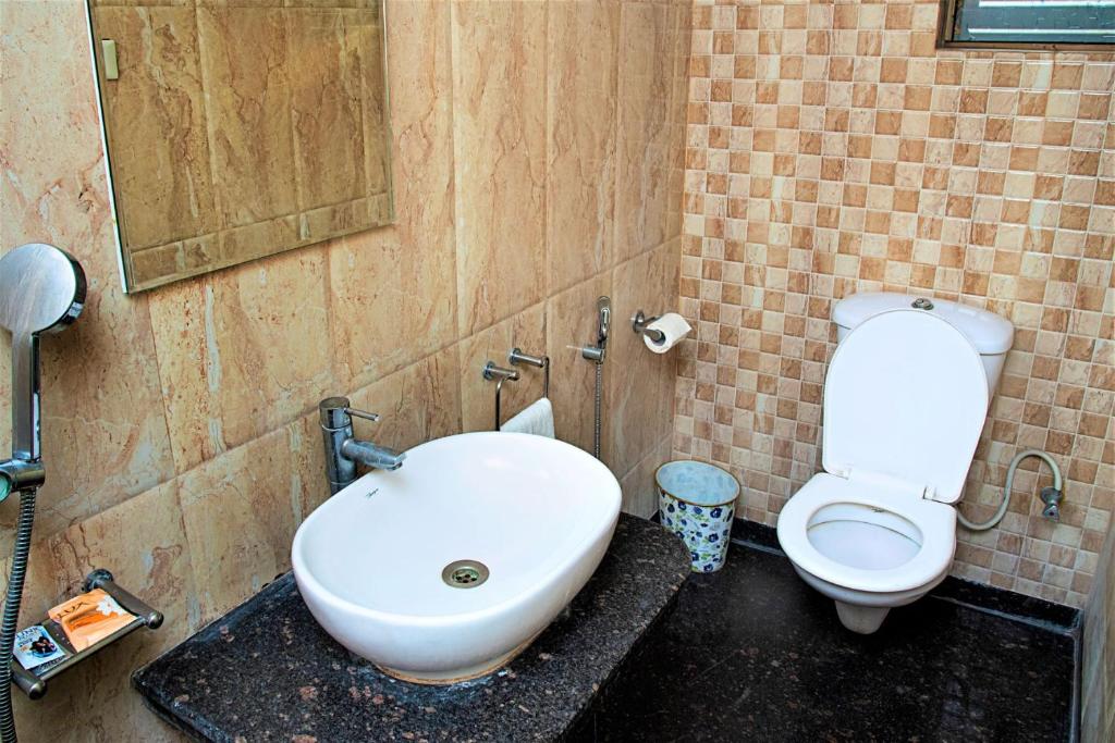 Koupelna v ubytování Reliable Inn