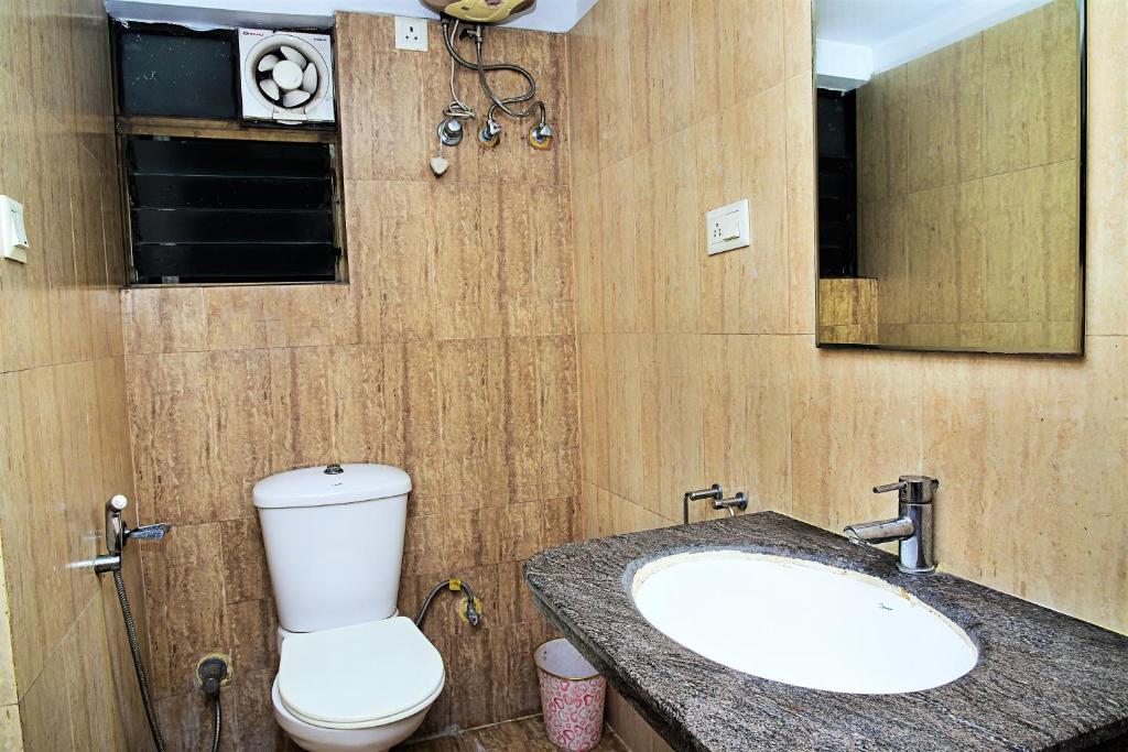Koupelna v ubytování Reliable Inn