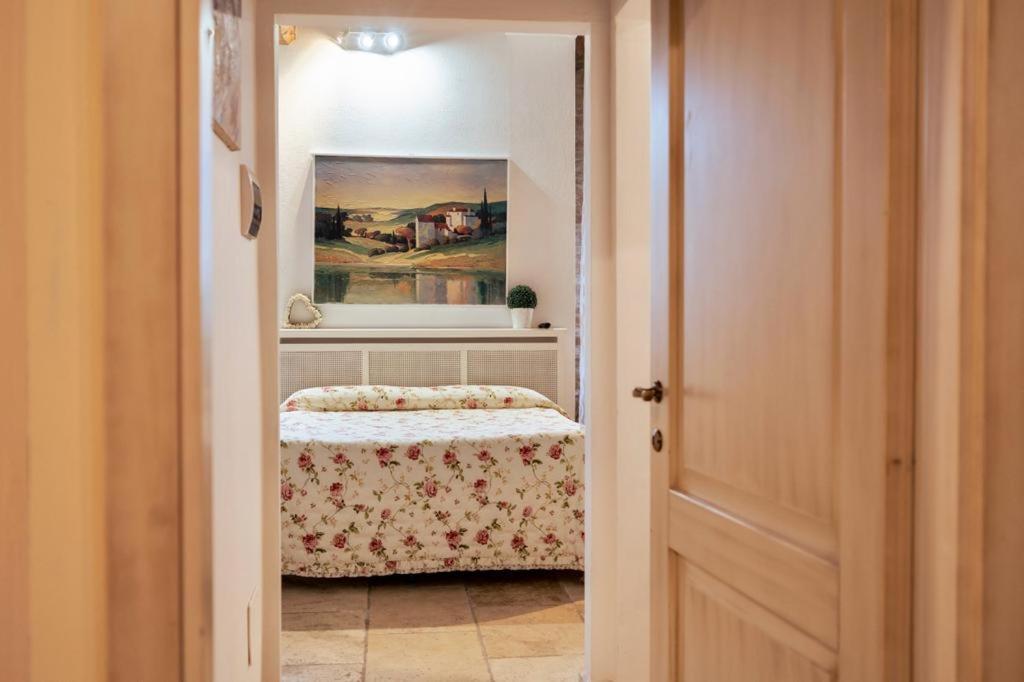 Postel nebo postele na pokoji v ubytování Agriturismo Percenna