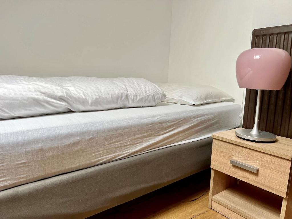 Postel nebo postele na pokoji v ubytování Hotel Garni Römerhof