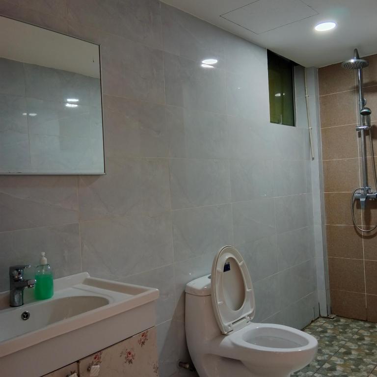 Koupelna v ubytování TOWERMAS HOTEL