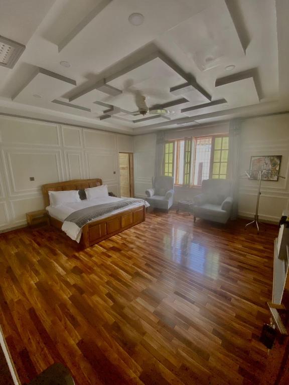 Postel nebo postele na pokoji v ubytování Dirleh Hotel