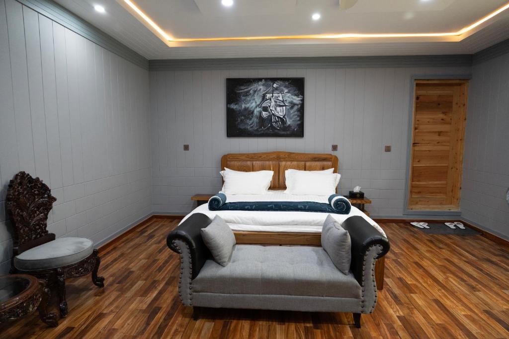 Postel nebo postele na pokoji v ubytování Dirleh Hotel