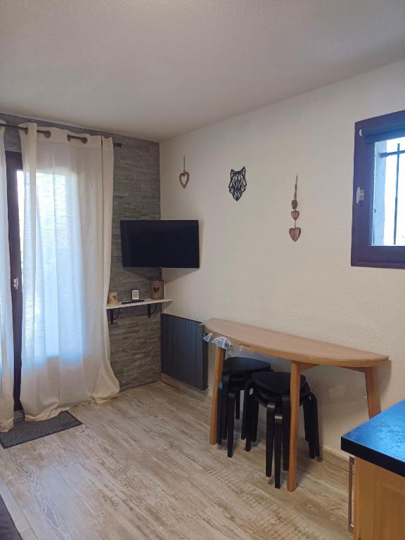 TV a/nebo společenská místnost v ubytování Appartement - Combloux