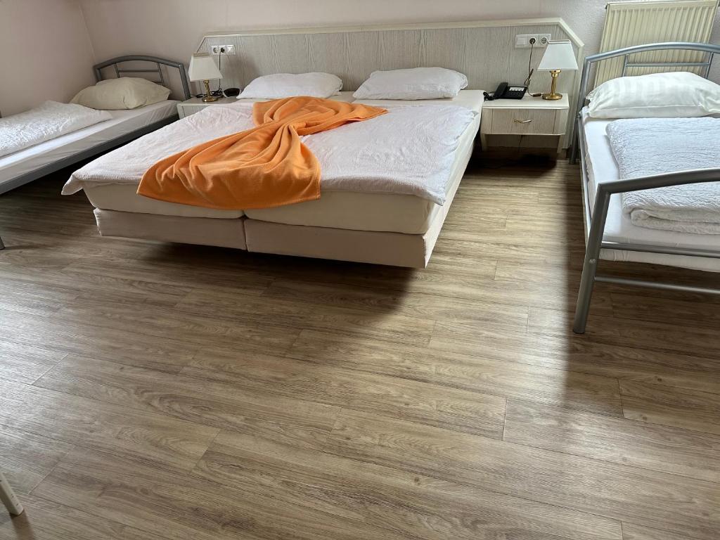 Postel nebo postele na pokoji v ubytování Hotel Garni Classico