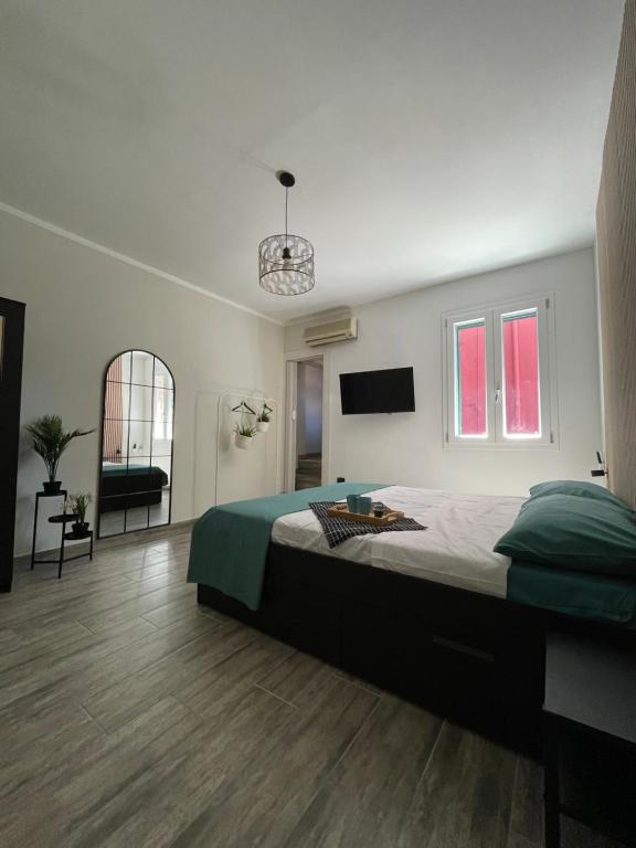 Кровать или кровати в номере Greta’s House - Napoli Centro