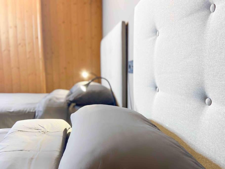 Postel nebo postele na pokoji v ubytování Lujoso Ático Dúplex En Valle De Incles - Parking Gratis l by BonesVacances