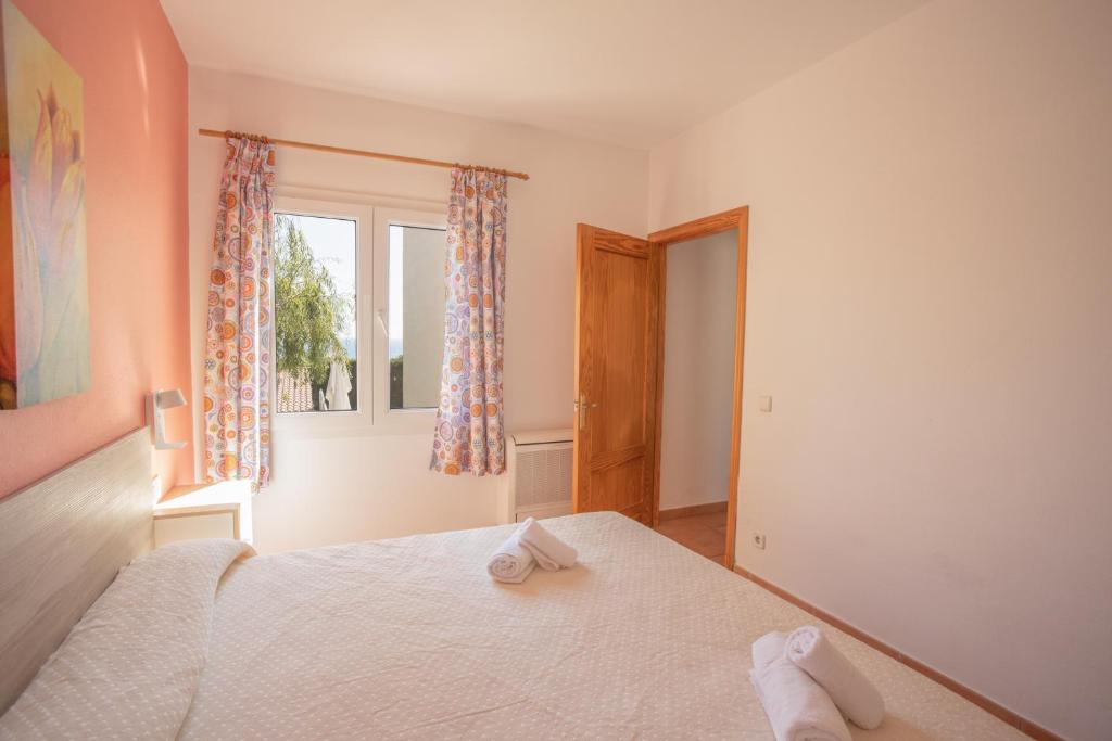 Postel nebo postele na pokoji v ubytování Villa Primavera V130 By MENORCARENTALS