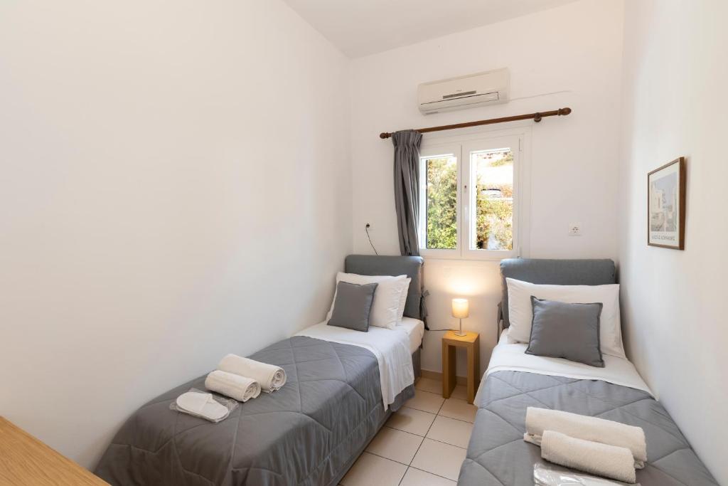 Postel nebo postele na pokoji v ubytování Mosha Pension