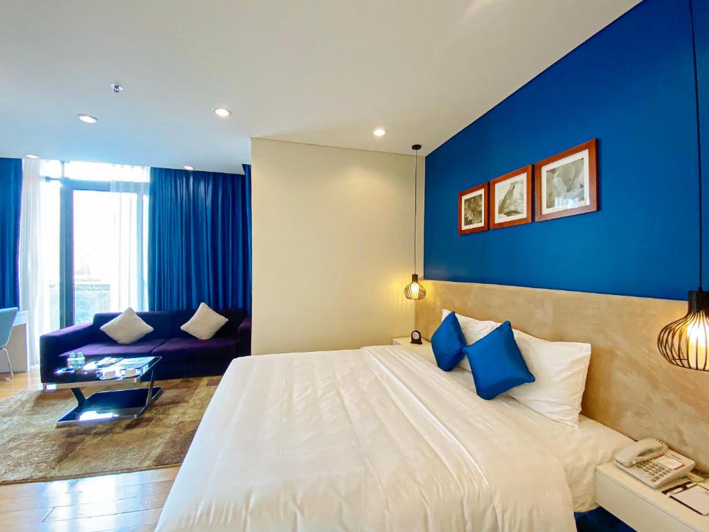 Postel nebo postele na pokoji v ubytování My Way Hotel & Residence Ha Noi