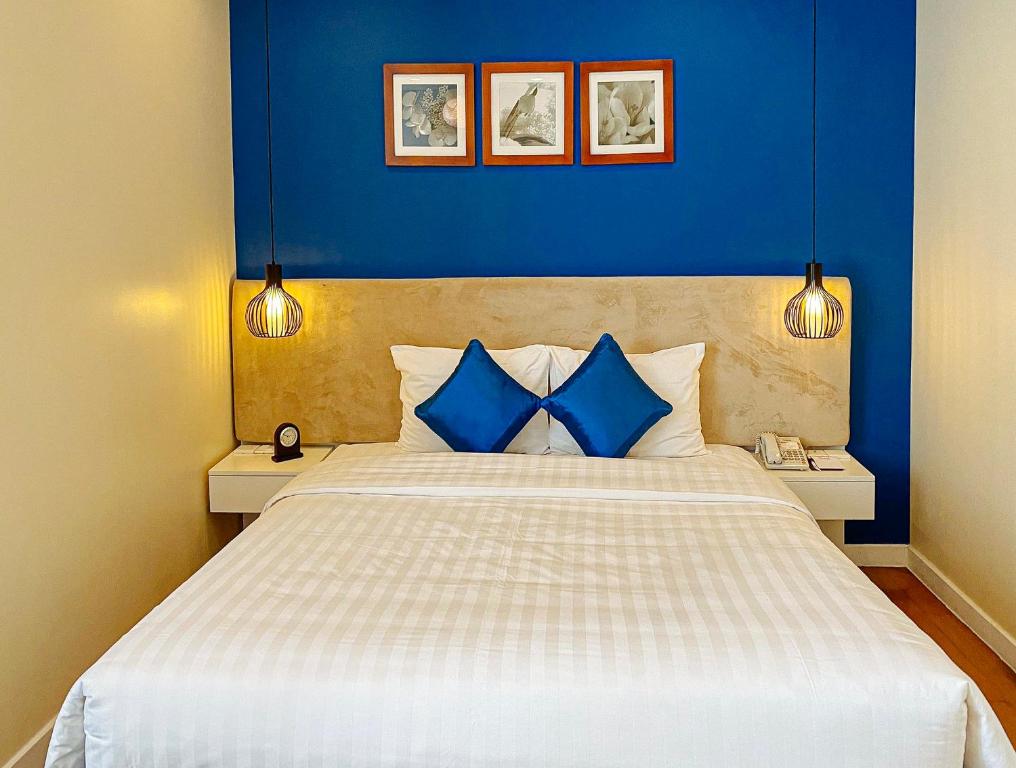 Postel nebo postele na pokoji v ubytování My Way Hotel & Residence Ha Noi