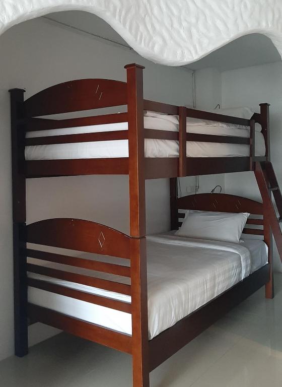 Postel nebo postele na pokoji v ubytování Big Boys' Bed & Burger - Patong Beach