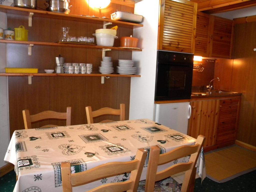 Kuchyň nebo kuchyňský kout v ubytování Residence Artuik Appartamenti Solandra