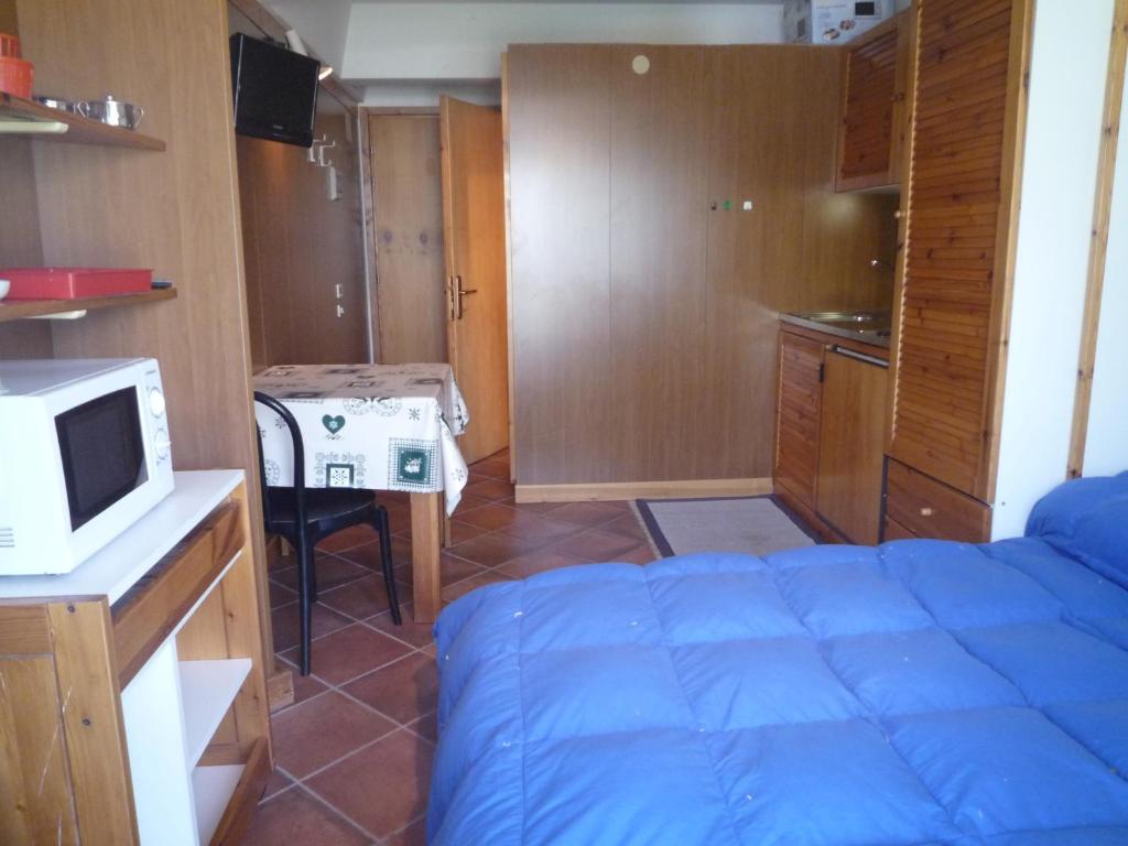 Postel nebo postele na pokoji v ubytování Residence Artuik Appartamenti Solandra