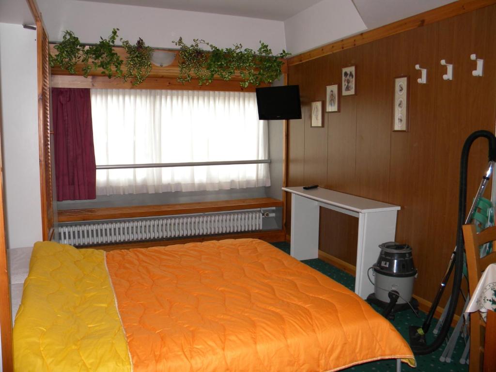 Postel nebo postele na pokoji v ubytování Residence Artuik Appartamenti Solandra