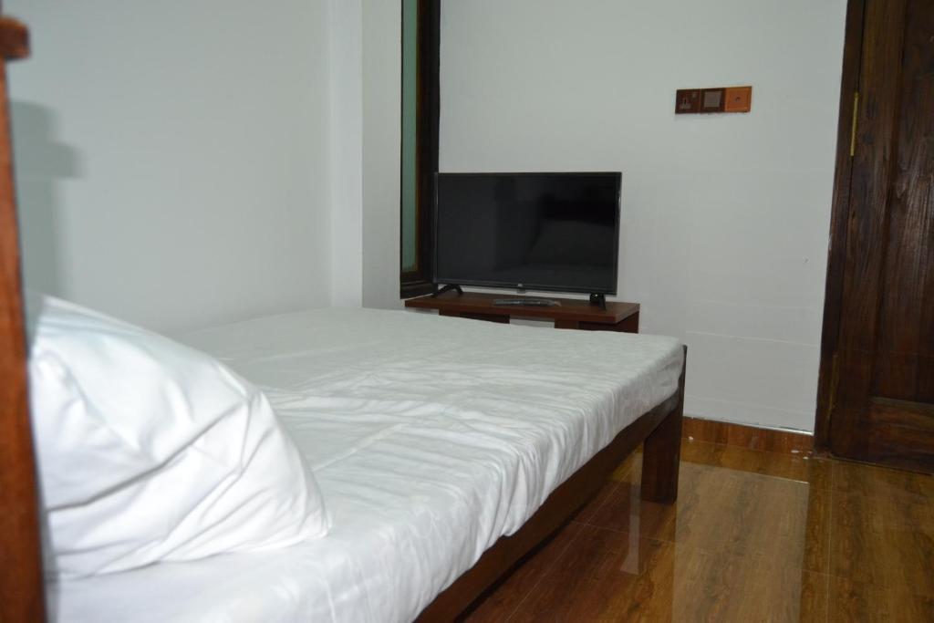 Postel nebo postele na pokoji v ubytování BW Residence