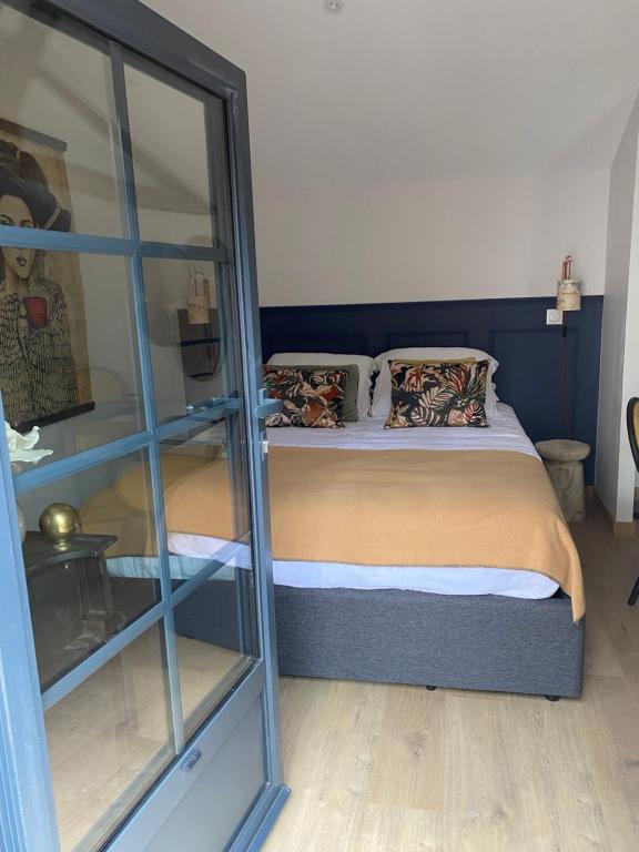 Postel nebo postele na pokoji v ubytování L'ATELIER 14 - Centre ville - Appartement entier- Neuf