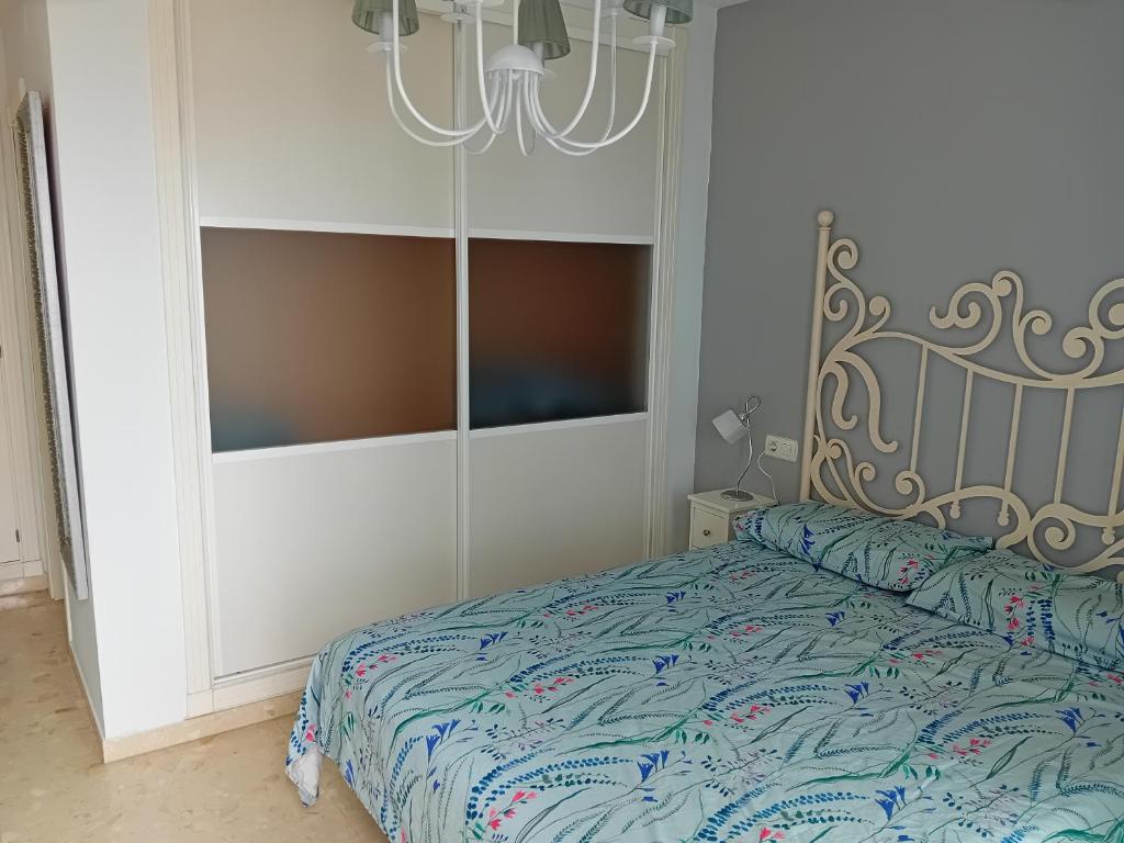 Postel nebo postele na pokoji v ubytování Mi Pequeño Oasis.
