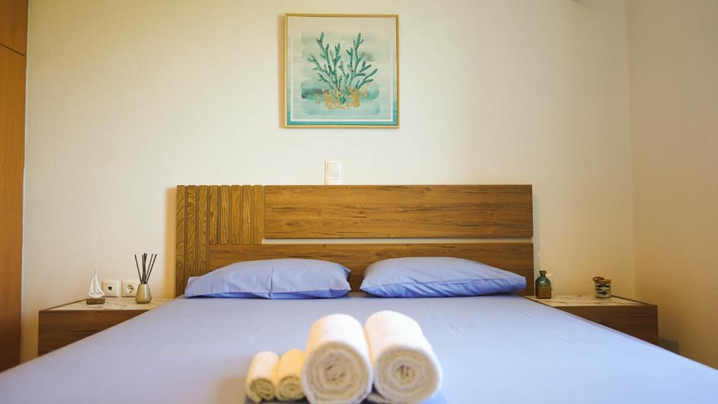 Postel nebo postele na pokoji v ubytování Urban Blue House