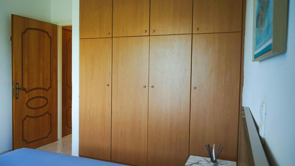 Postel nebo postele na pokoji v ubytování Urban Blue House