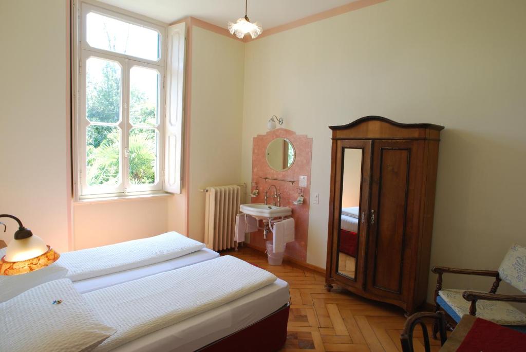 Postel nebo postele na pokoji v ubytování Hotel&Hostel Montarina