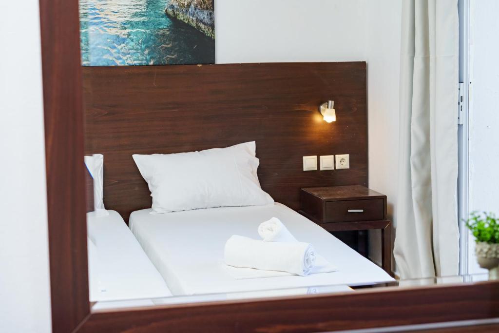 Postel nebo postele na pokoji v ubytování MaYo Rooms Zakynthos