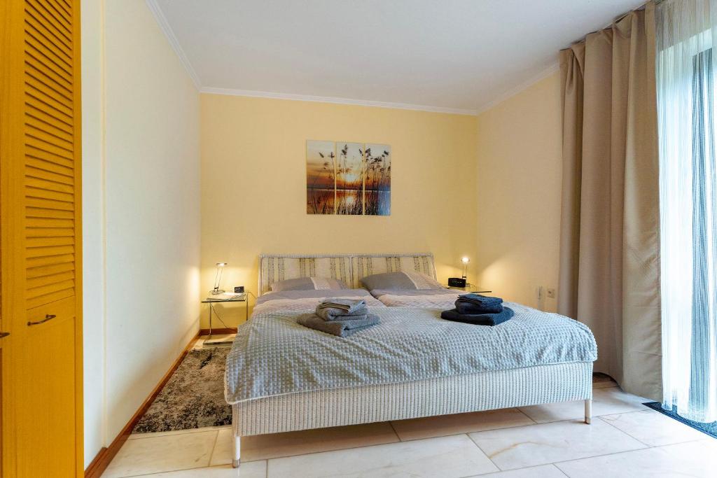 Postel nebo postele na pokoji v ubytování Ferienwohnung 1