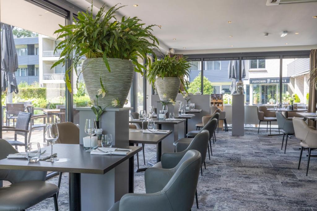 Posezení v ubytování Fletcher Hotel-Restaurant De Buunderkamp