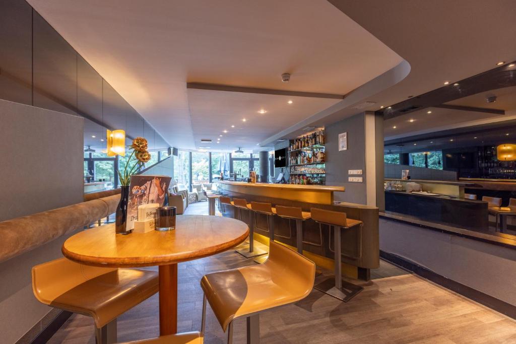 Posezení v ubytování Fletcher Hotel-Restaurant De Buunderkamp
