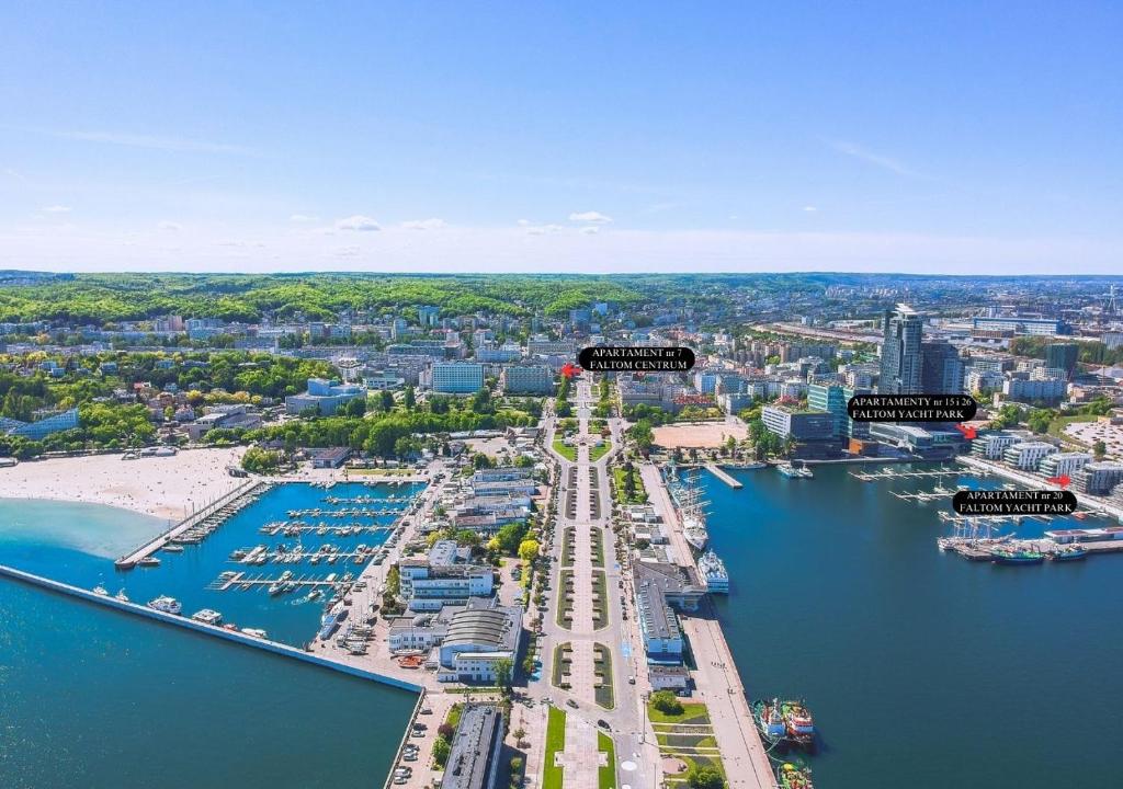 an aerial view of a harbor with boats in the water at Apartament Faltom LUX z tarasem Yacht Park in Gdynia