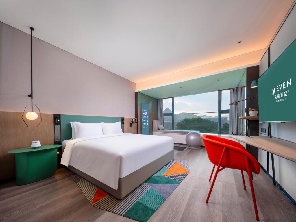 Postel nebo postele na pokoji v ubytování EVEN Hotels Shenzhen Guangming Cloud Park by IHG