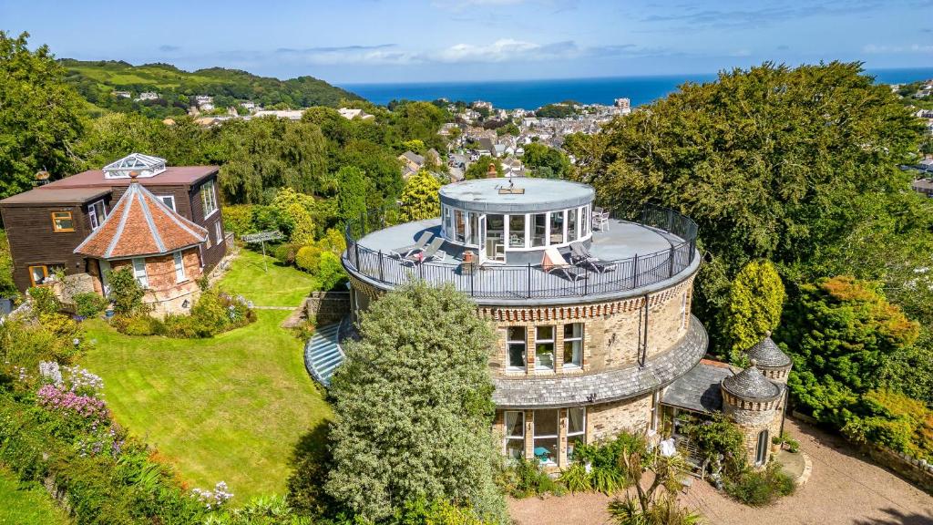 an aerial view of a house with aidium at The Round House - Panoramic views of Devon's Coast and Country in Ilfracombe