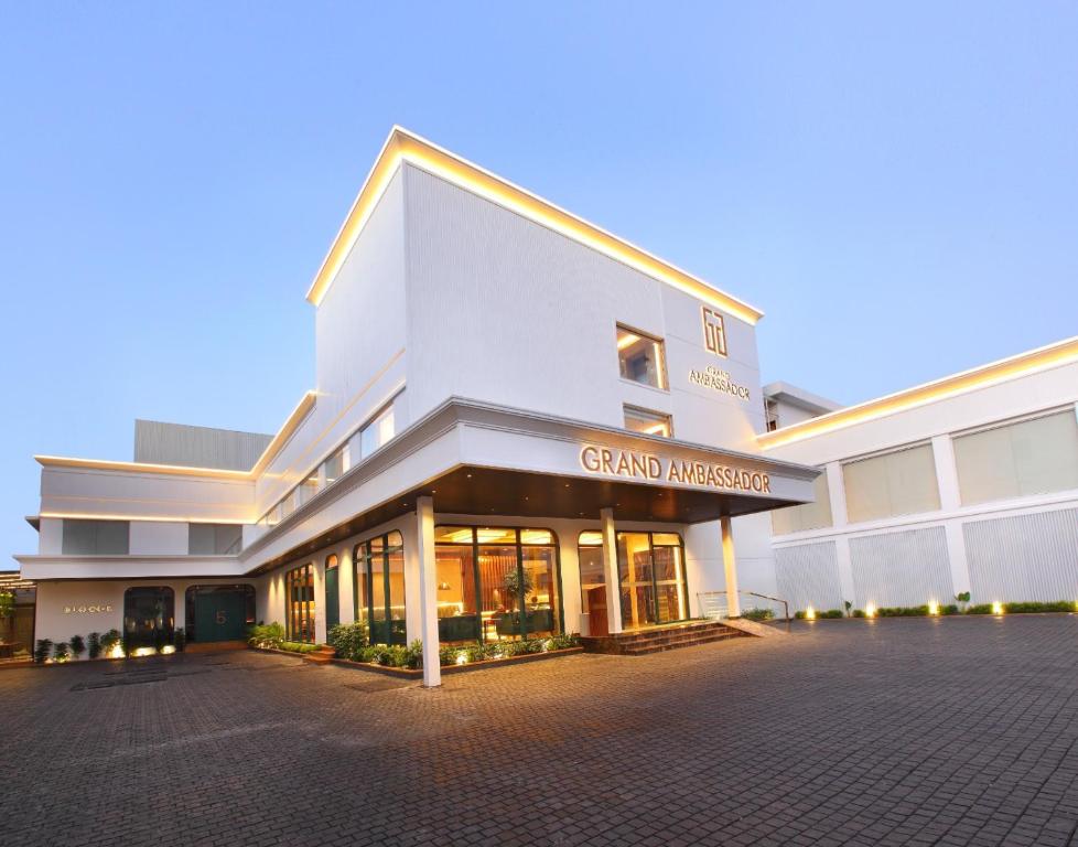 a grand entrance to a grand america hotel at THE GRAND AMBASSADOR HOTEL in Kottayam