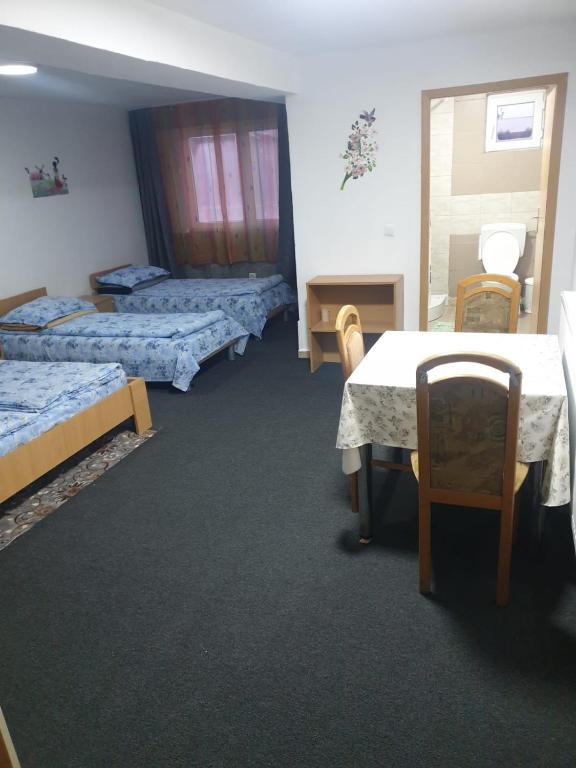 Postel nebo postele na pokoji v ubytování Hotel Mya