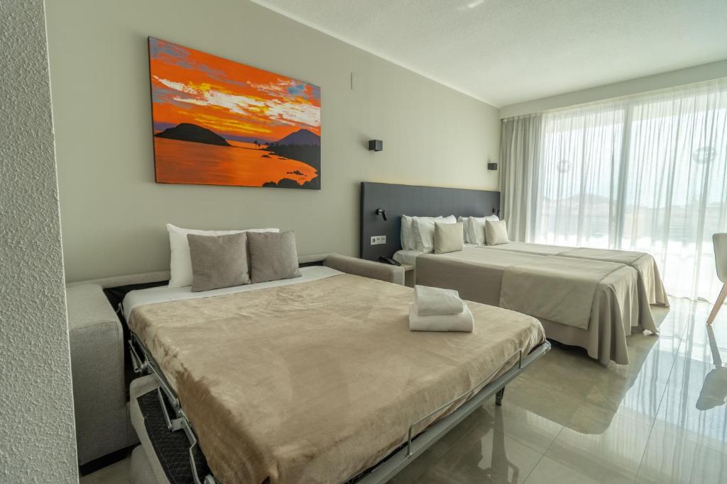 Dos Playas - 30º hotels - Triple Chambre De Luxe Avec Vue De La Piscine