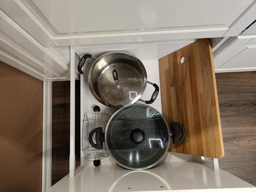 Kuchyň nebo kuchyňský kout v ubytování APARTHOTEL