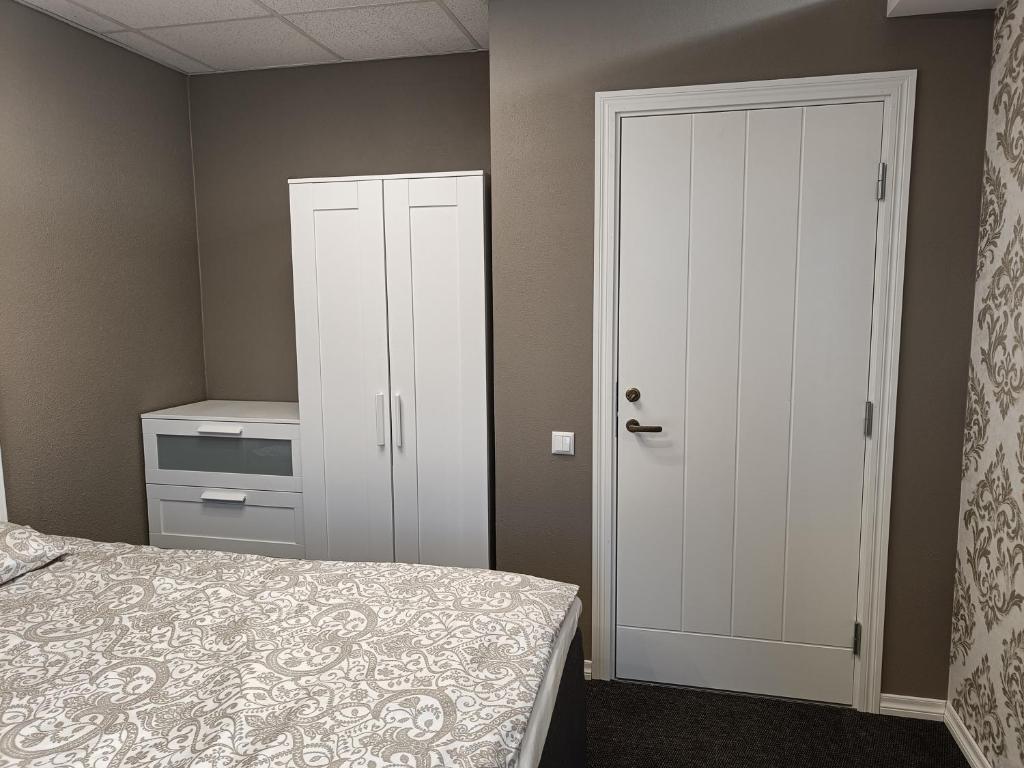 Postel nebo postele na pokoji v ubytování APARTHOTEL