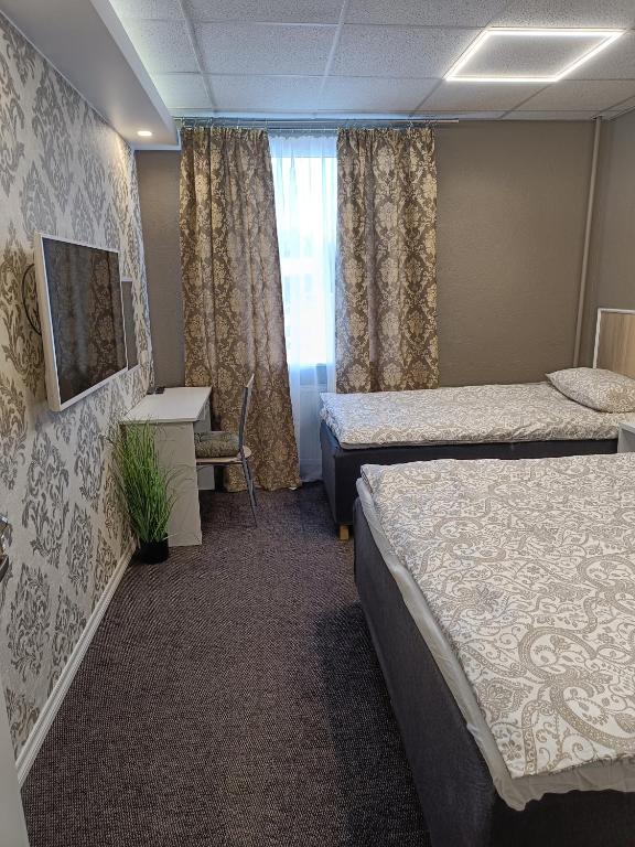 TV a/nebo společenská místnost v ubytování APARTHOTEL