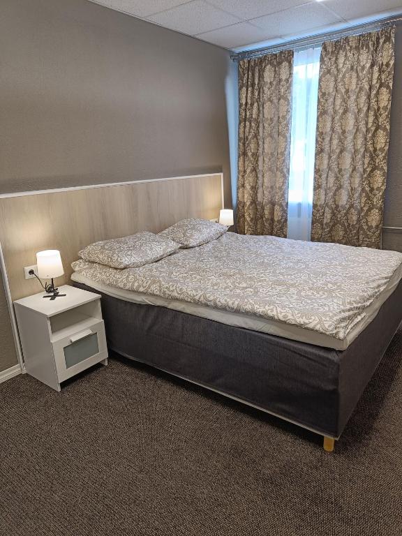 Postel nebo postele na pokoji v ubytování APARTHOTEL