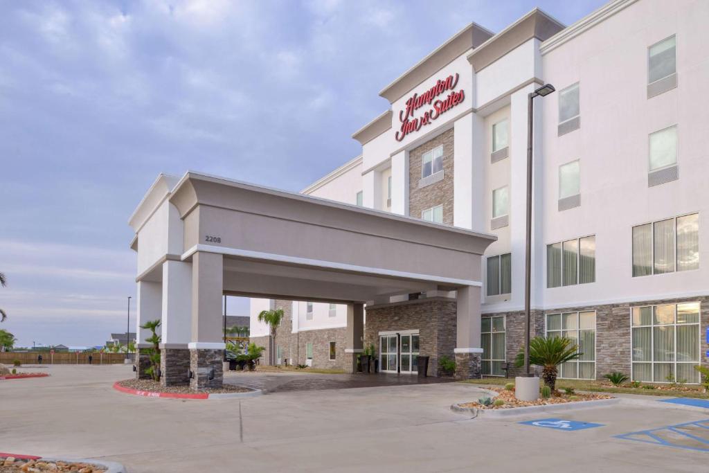 a rendering of the front of a hotel at Hampton Inn and Suites Port Aransas in Port Aransas