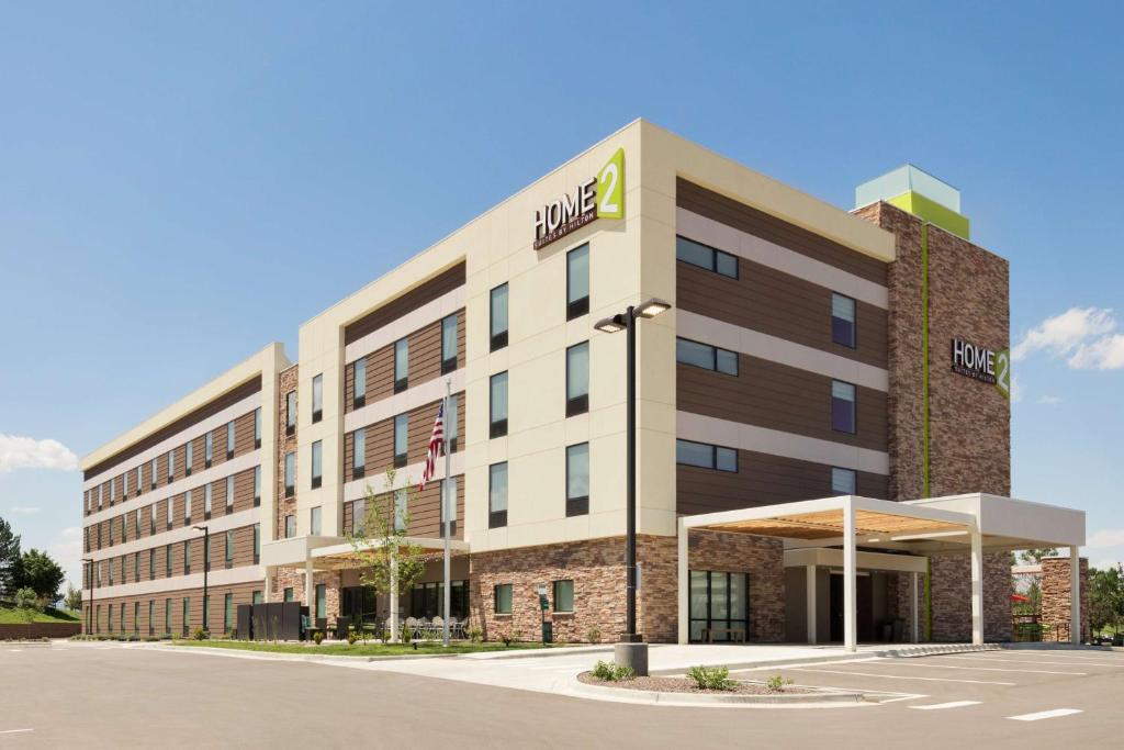 a rendering of a hotel with a building at Home2 Suites by Hilton Denver Highlands Ranch in Highlands Ranch
