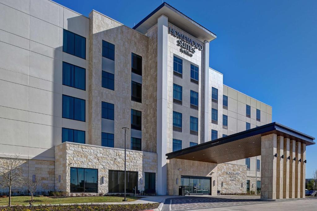 a rendering of the front of a building at Homewood Suites by Hilton Dallas The Colony in The Colony